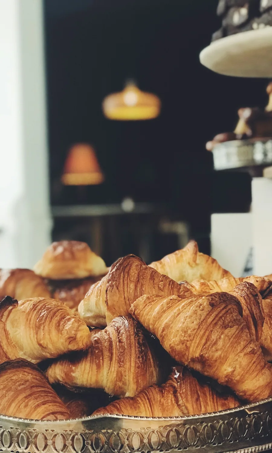 Pastry tray of fresh-baked croissants in our cafe window