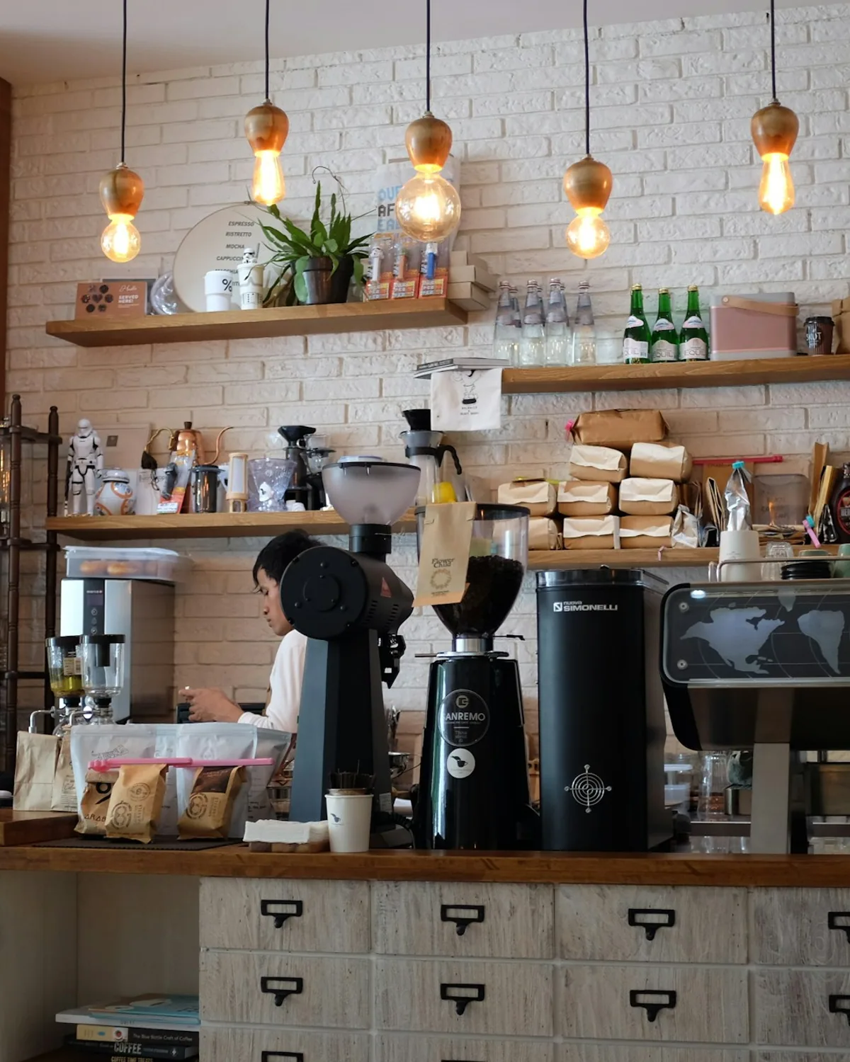 Inside Card's Bakery — wooden counter, fresh-baked goods, warm afternoon light